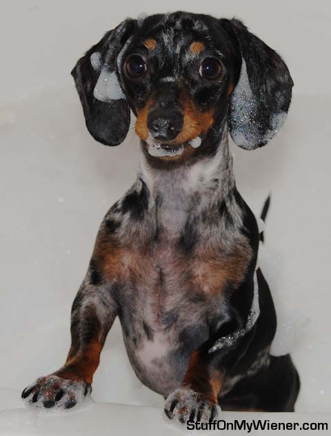 Greta playing in bubbles from her bath.
