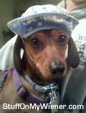 Sophie in a fisherman’s hat.