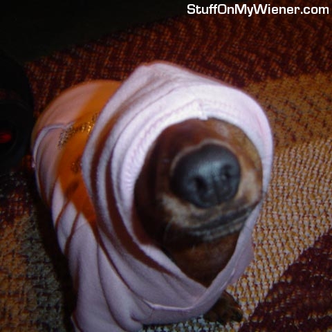 Simone with a hoody over her head.